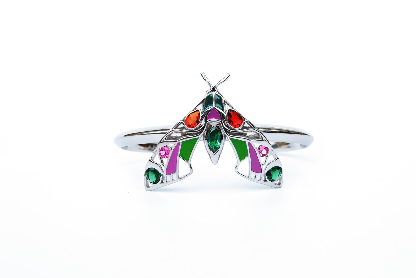 Silver moth cuff bracelet displayed on white background