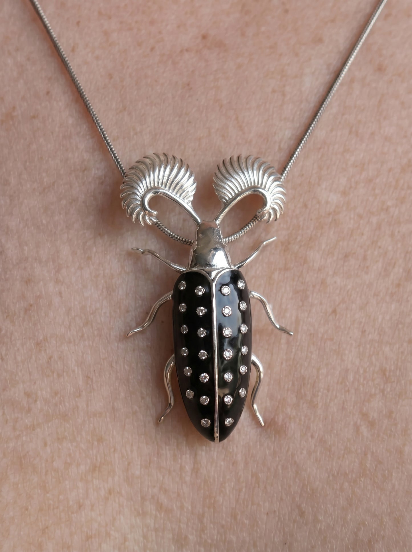 Feather‑Horned Beetle Pendant — Rhipicera sp. • Black Enamel + Crystals