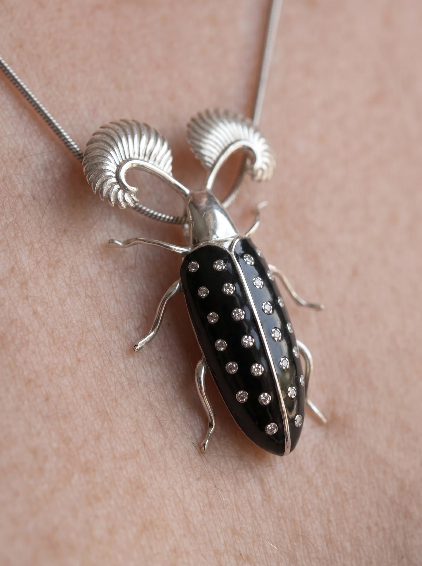 Feather‑Horned Beetle Pendant — Rhipicera sp. • Black Enamel + Crystals