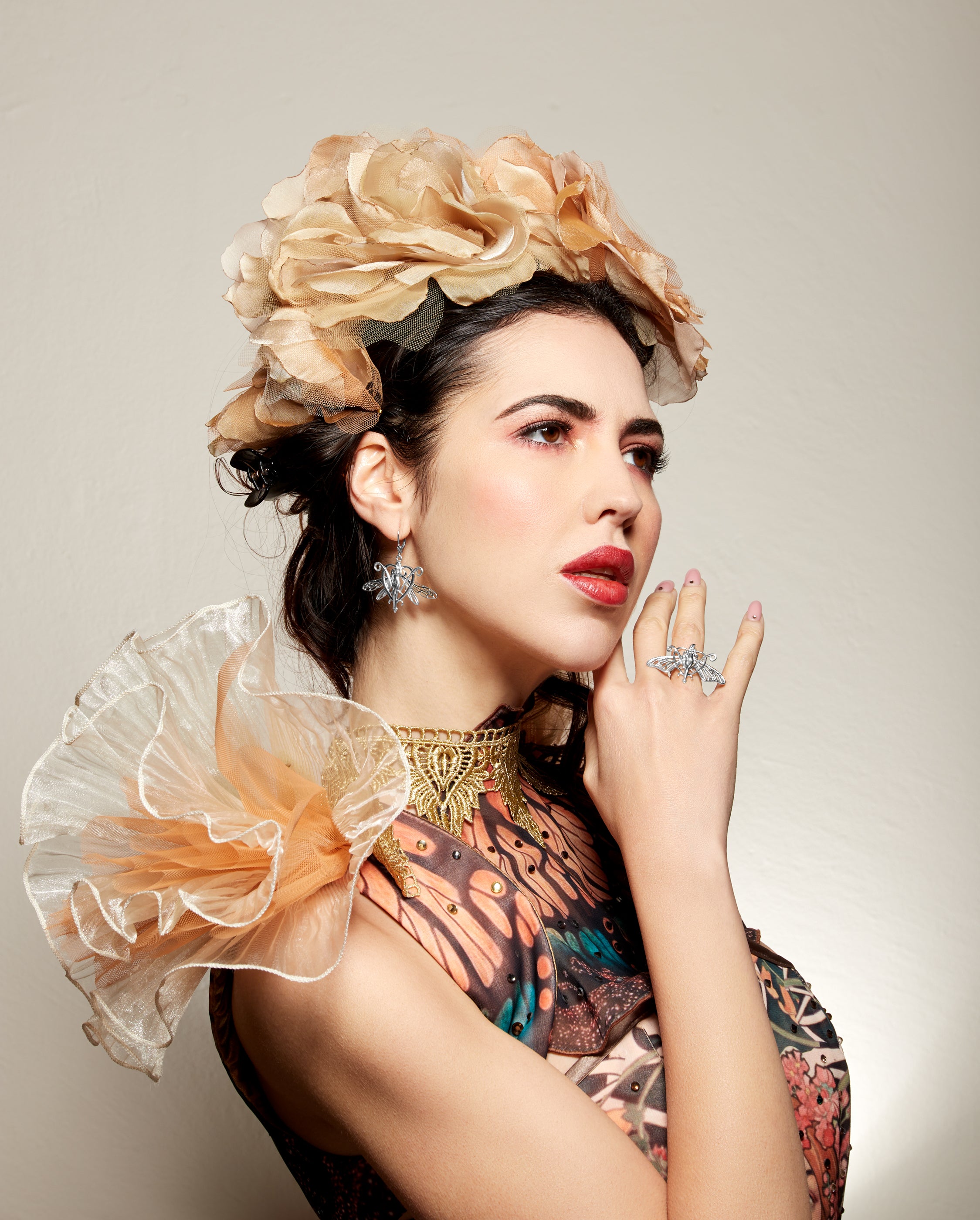 Model wearing Monarch Butterfly Nymph Earrings in side view