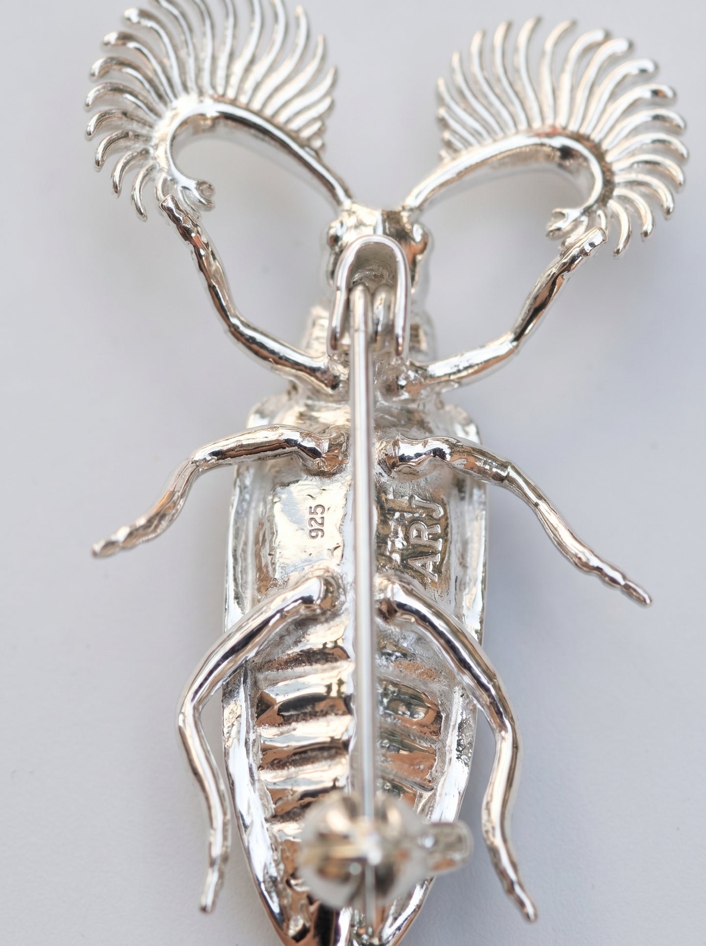 Feather‑Horned Beetle Brooch — Rhipicera sp. • Black Enamel + Crystals