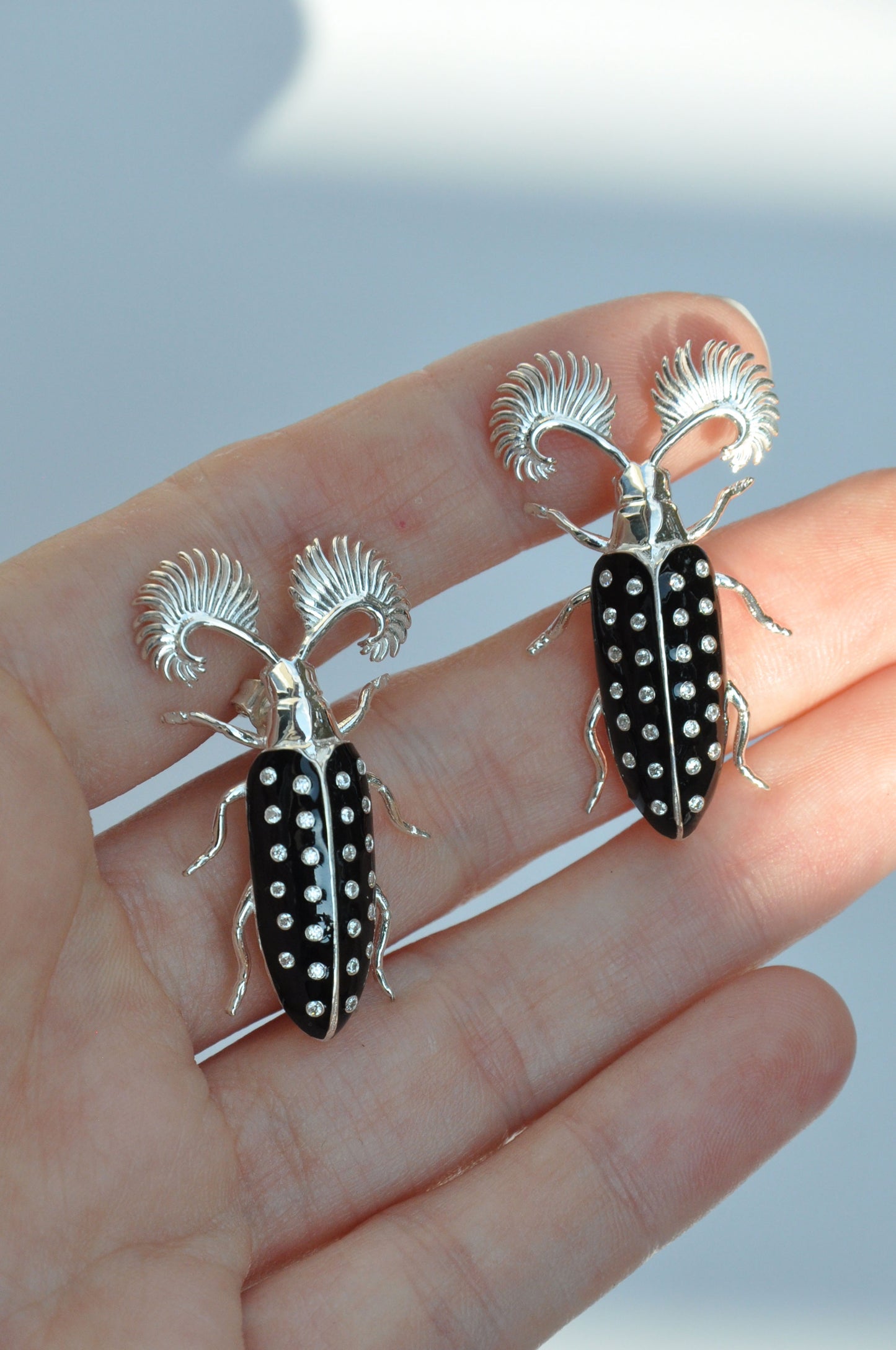 Feather‑Horned Beetle Stud Earrings — Rhipicera sp. • Black Enamel + Crystals