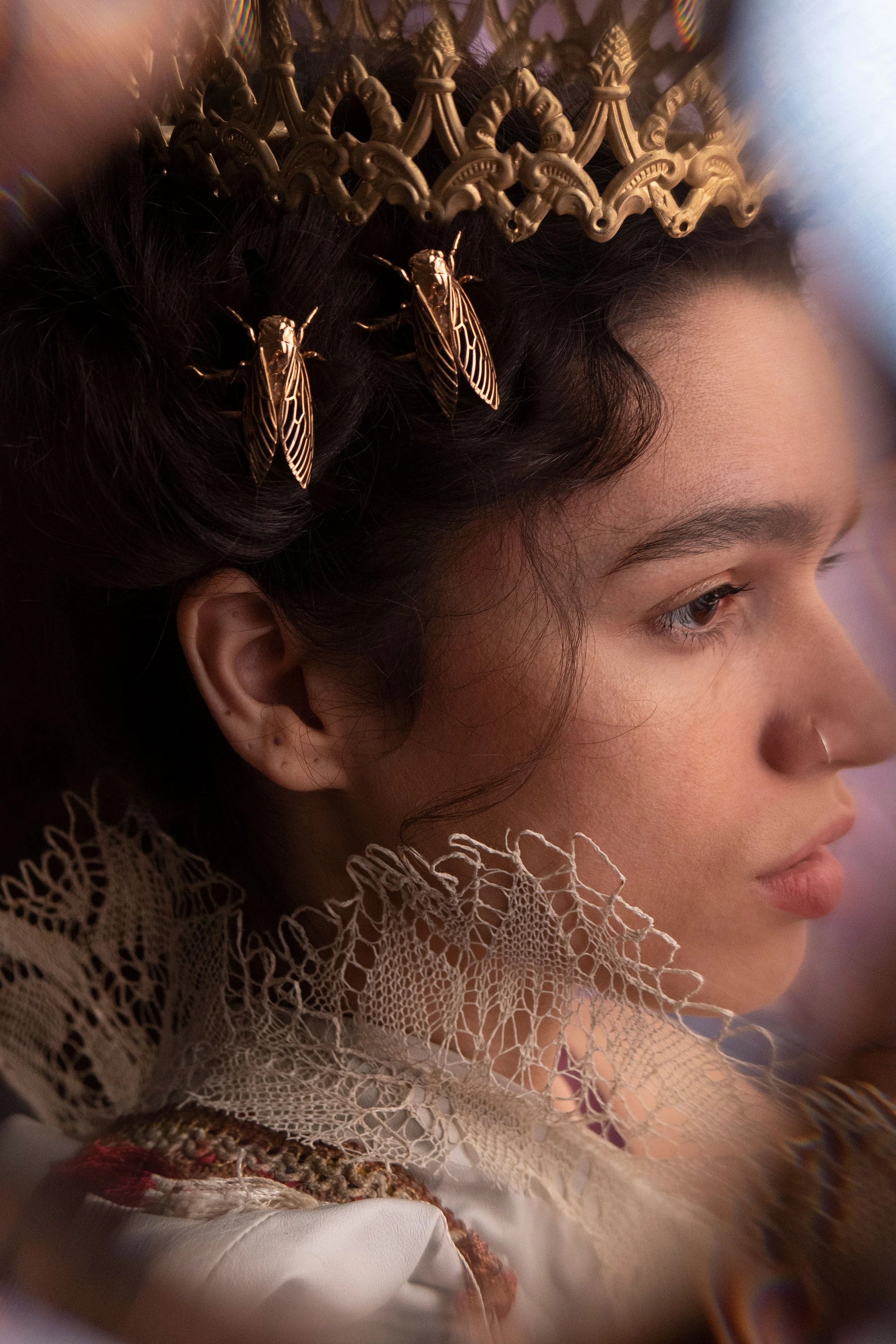 Model wearing bronze Cicada hair pins styled in a nature-inspired look, showcasing handcrafted insect jewelry with detailed wing cutouts and vintage bronze finish.