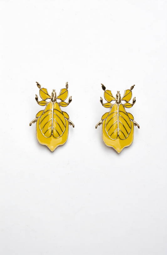 Yellow enamel Phylliidae leaf‑insect stud earrings with gold legs and leaf‑vein detailing.