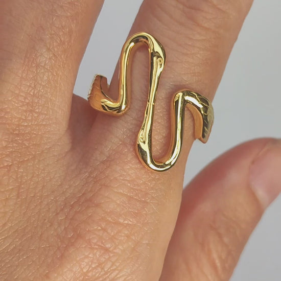 Video preview showing Heron Kiss Ring and matching bracelet worn together, capturing fluid Art Nouveau curves and reflective surfaces.