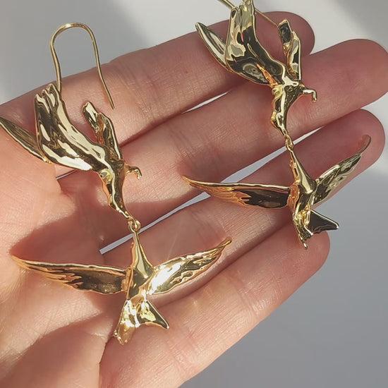Video preview showing Kiss in Flight Arctic Tern Earrings and inspiration, capturing polished surfaces and delicate bird contours.