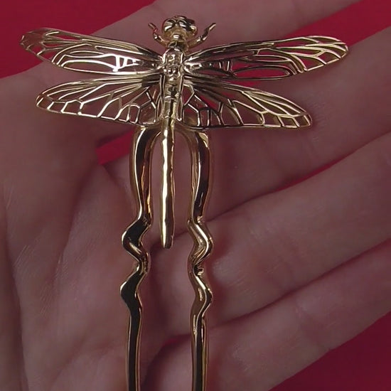 Video of handcrafted Dragonfly Hair Pin in 14k gold plated finish – insect-inspired hair accessory with detailed wings and polished surface, designed by Anna Reikher