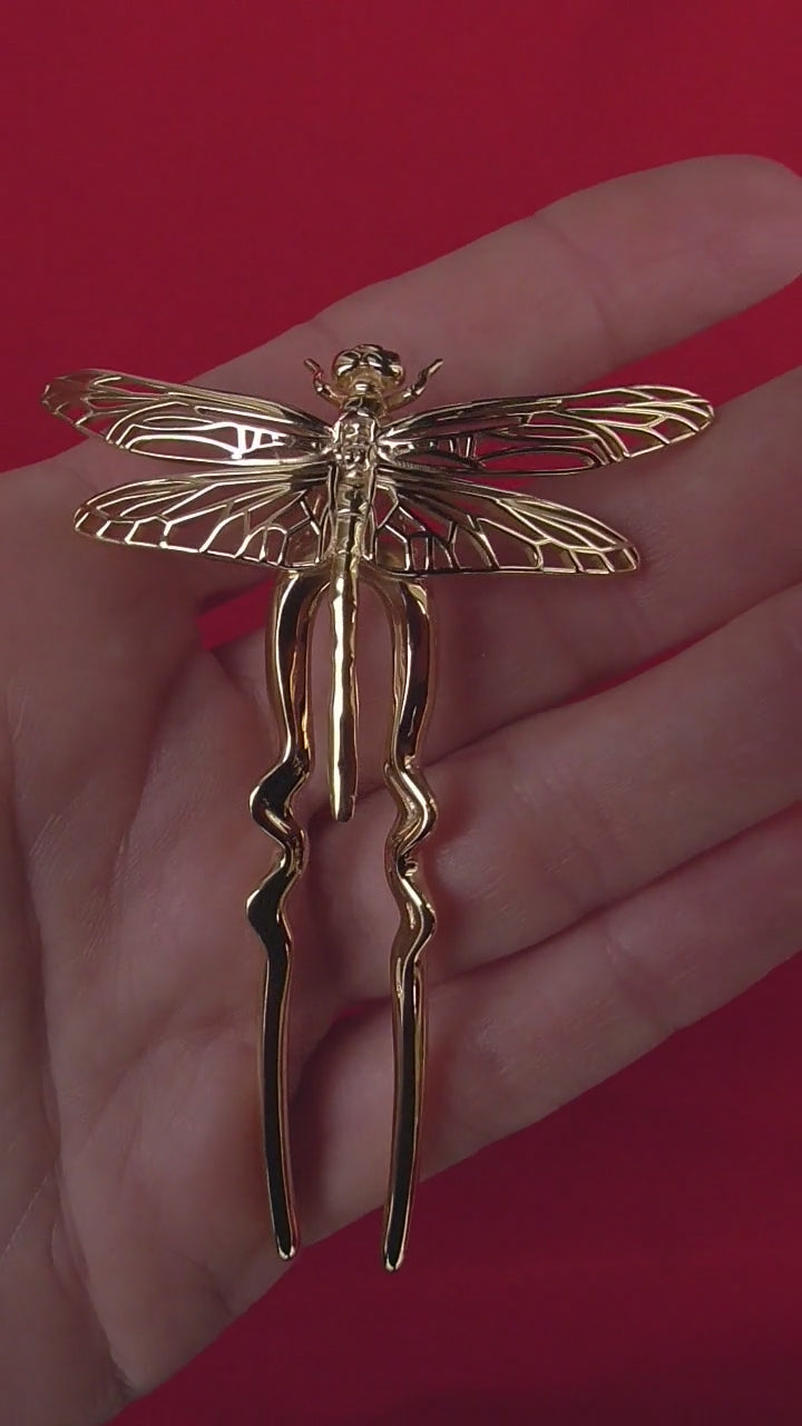 Video of handcrafted Dragonfly Hair Pin in 14k gold plated finish – insect-inspired hair accessory with detailed wings and polished surface, designed by Anna Reikher