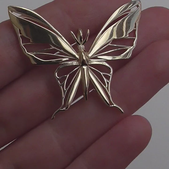 Gold butterfly pendant necklace video showcasing details