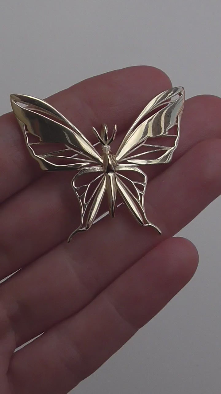 Gold butterfly pendant necklace video showcasing details