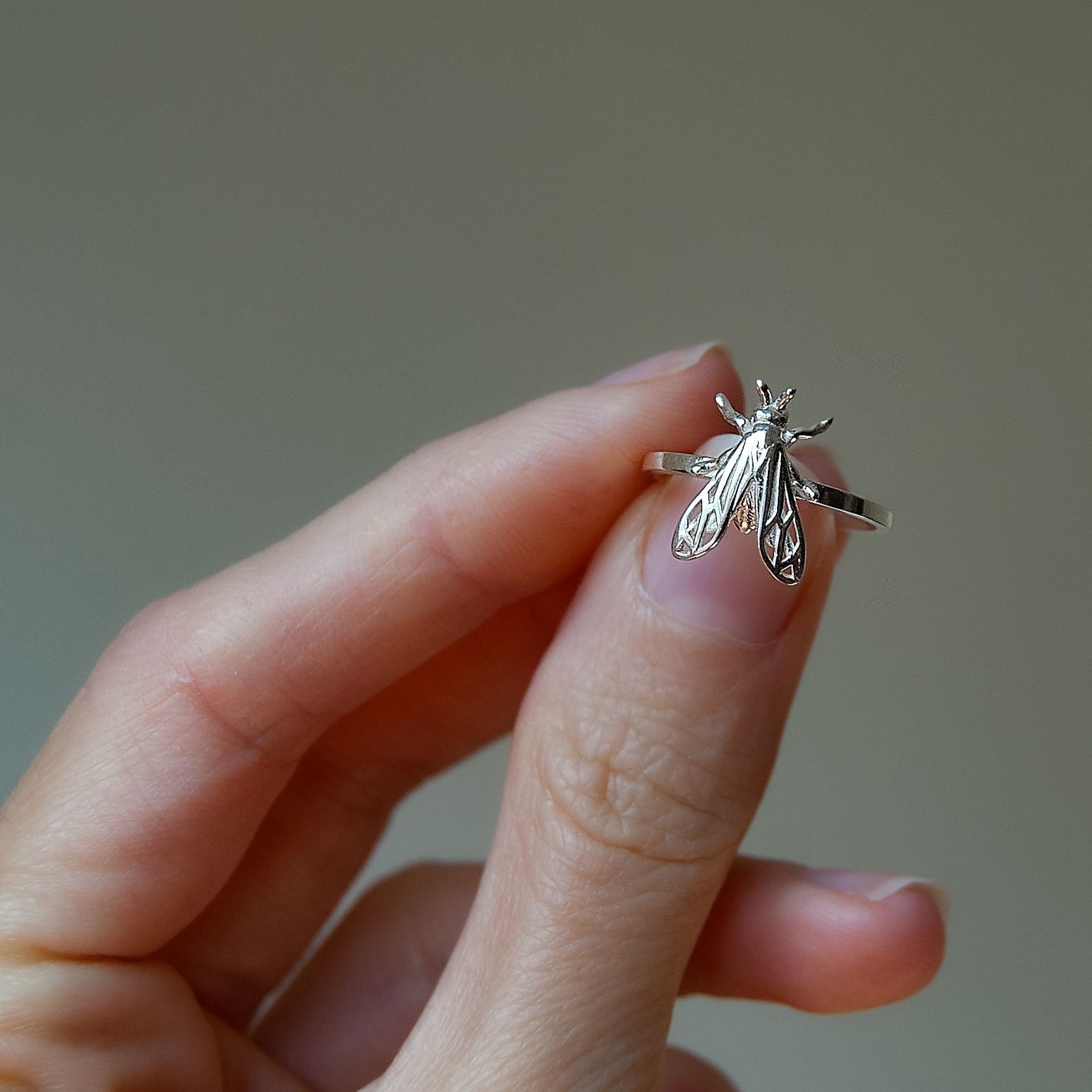 Collection of nature-inspired insect jewelry including rings 